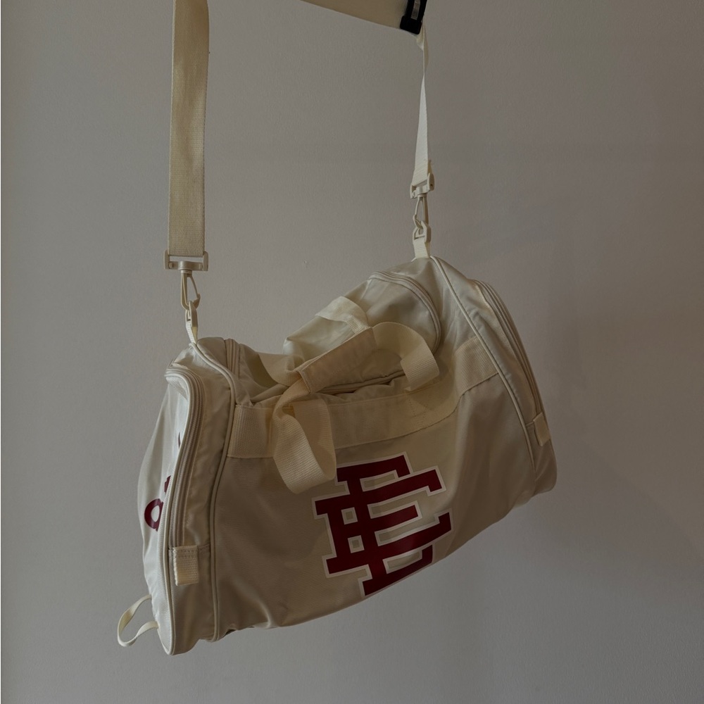 Cream and Red Duffel Bag